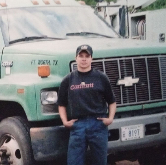 Joe Hampson in front of a BNSF vehicle